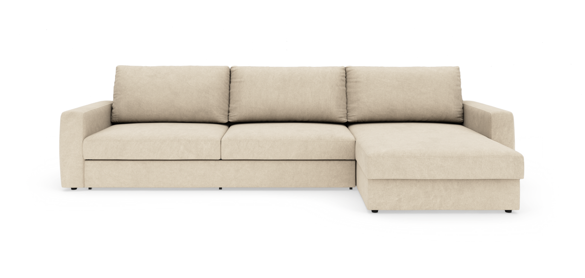 Beige hjørnesofa med chaiselong til højre, tre sædehynder og lige armlæn.