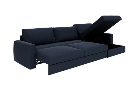 Mørkeblå sovesofa med chaiselong og løftet opbevaringsrum i højre side, fritlagt på hvid baggrund.