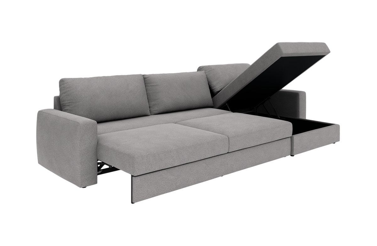 Lysegrå sovesofa med chaiselong og opklappeligt opbevaringsrum, vist i skrå frontvinkel.