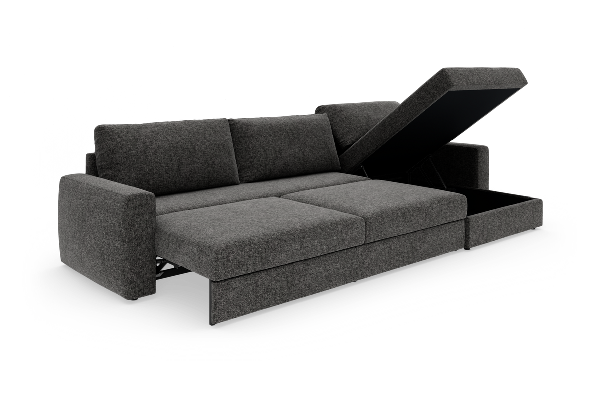 Mørkegrå sovesofa med åben chaiselong og skjult opbevaring, vist som frilagt studieproduktfoto.