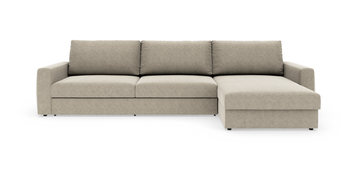 Beigefarvet modulsofa med chaiselong i højre side, frilagt mod hvid baggrund i frontal visning.