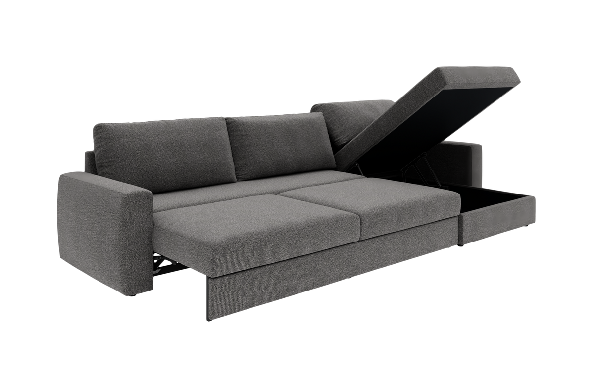 Grå sovesofa med åben chaiselong og opbevaringsrum, vist i 3/4‑vinkel i studiemiljø.