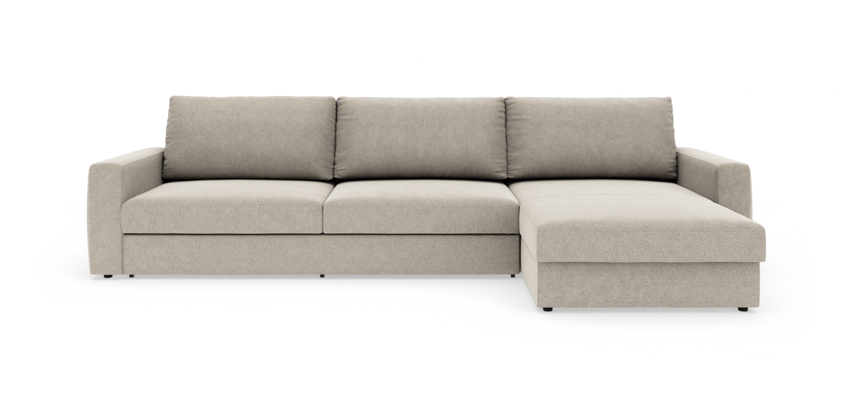 Beigefarvet hjørnesofa med chaiselong til højre, frilagt på hvid baggrund.