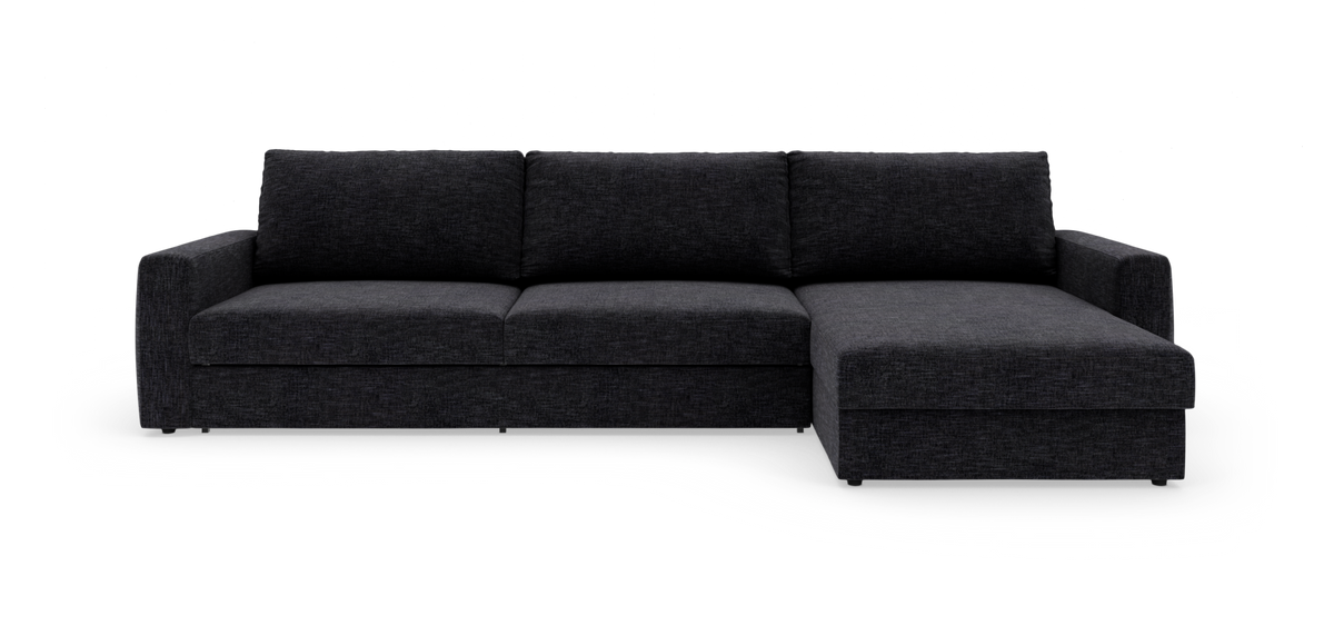 Mørkegrå hjørnesofa med chaiselong til højre, fritstående på hvid baggrund.