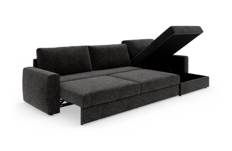 Mørkegrå sovesofa med chaiselong og opklappeligt opbevaringsrum på hvid studiobaggrund.