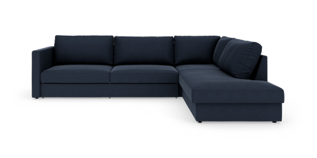 Mørkeblå L-formet modulsofa med chaiselong til højre, frilagt på hvid baggrund.
