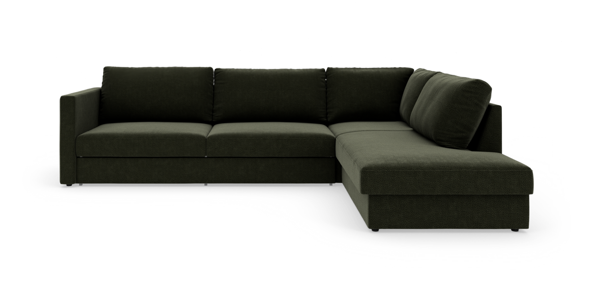 Mørkegrøn L‑sofa med chaiselong til højre, tre sæder og fyldige ryghynder på hvid baggrund.