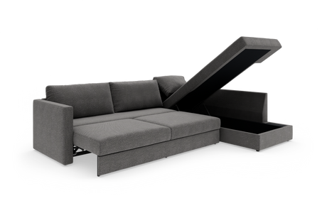Grå sovesofa med chaiselong og opklappelig opbevaring, fotograferet i studie.