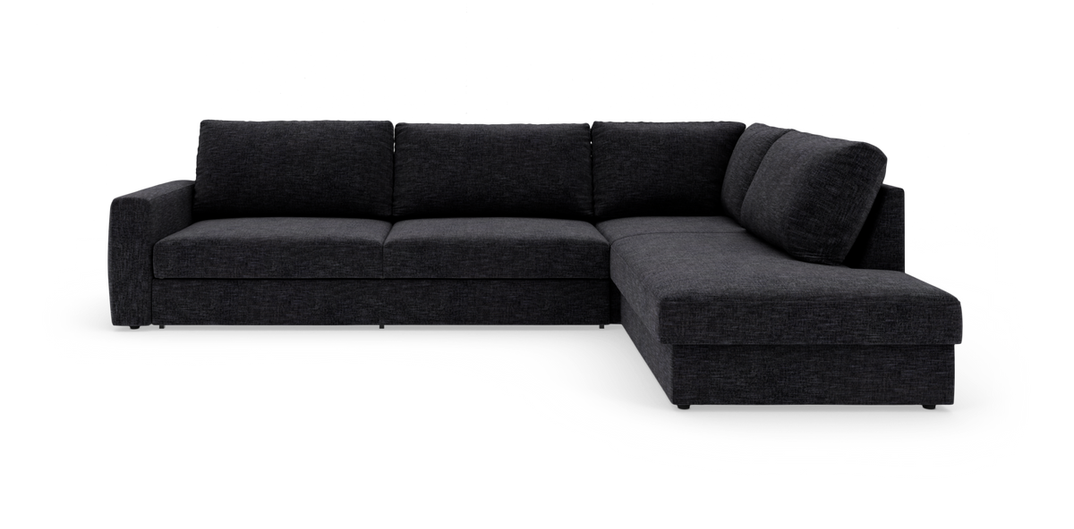 Mørkegrå L-formet hjørnesofa med chaiselong til højre, isoleret på hvid baggrund.
