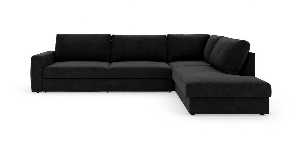 Sort L‑formet modulsofa med chaiselong til højre, frilagt på hvid baggrund.
