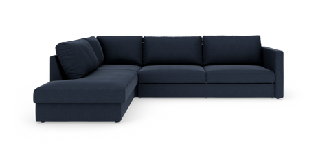 Mørkeblå L-sofa med chaiselong til venstre på hvid studiebaggrund.