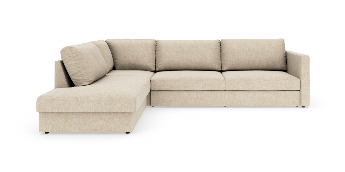 Beige L‑formet modulsofa med chaiselong til venstre, rene linjer og stofbetræk.