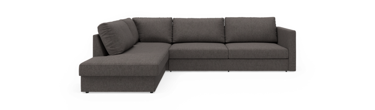 Mørkegrå L‑sofa med venstrevendt chaiselong, frilagt på sort baggrund.