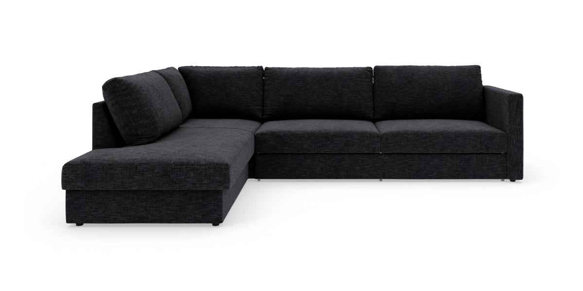 Mørkegrå L-formet hjørnesofa med chaiselong til venstre, frilagt på hvid baggrund.
