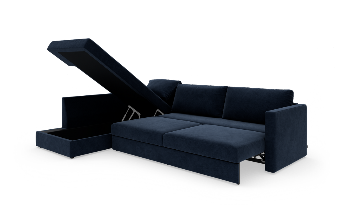Mørkeblå hjørnesofa med sovefunktion og åben chaiselong med opbevaring, frilagt på hvid baggrund.
