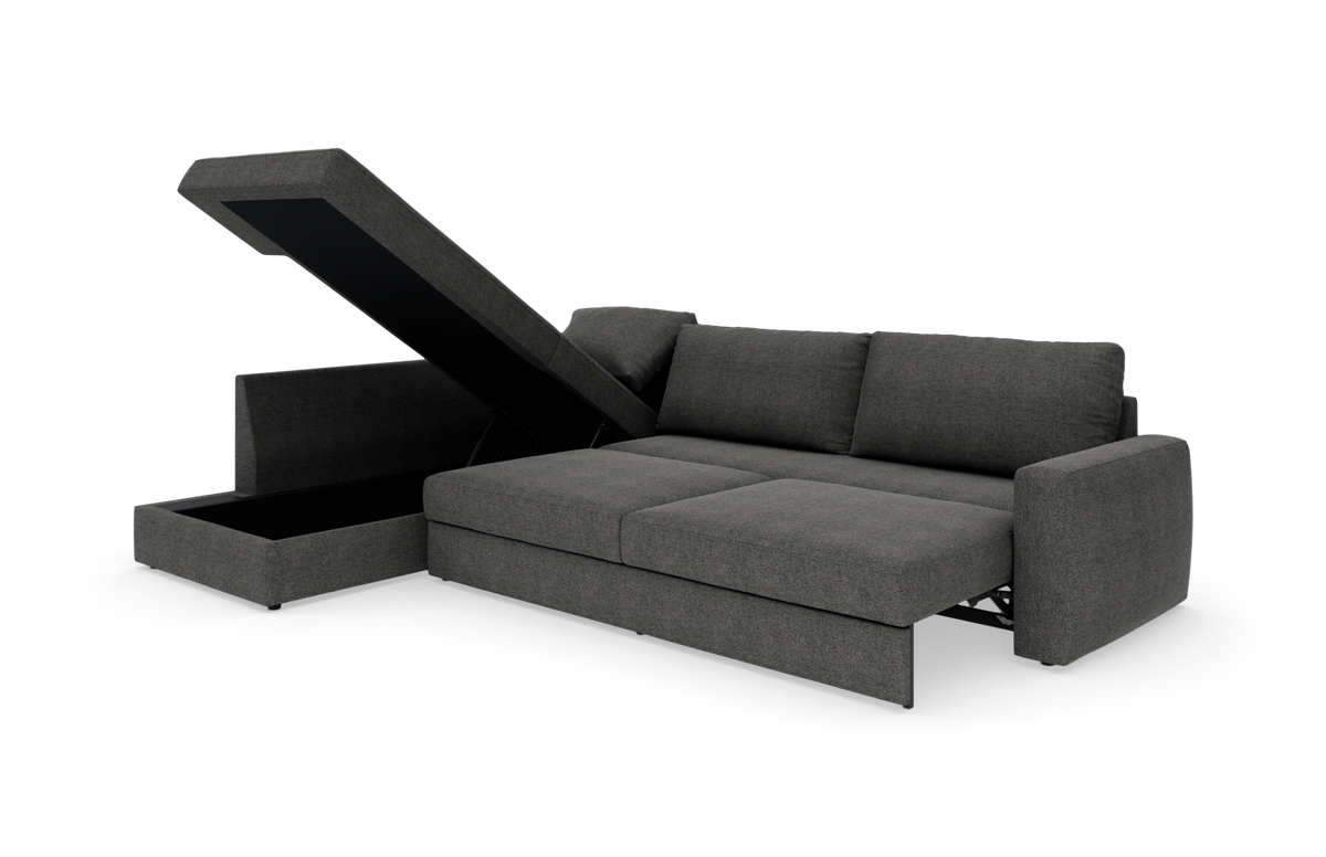 Mørkegrå hjørnesovesofa med åben chaiselong og opbevaring, frilagt på hvid baggrund.