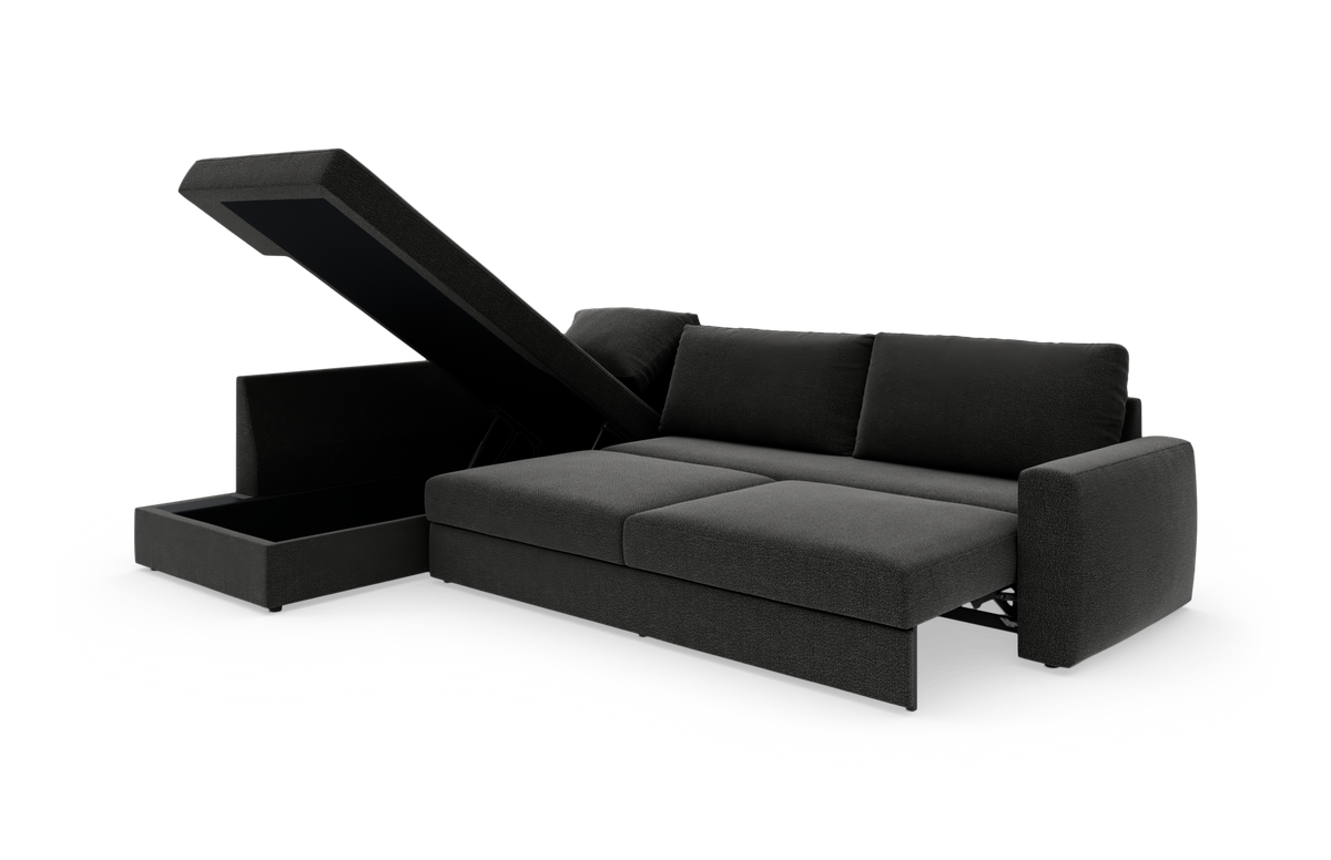 Mørkegrå sovesofa med chaiselong og åbent opbevaringsrum, frilagt på hvid baggrund.