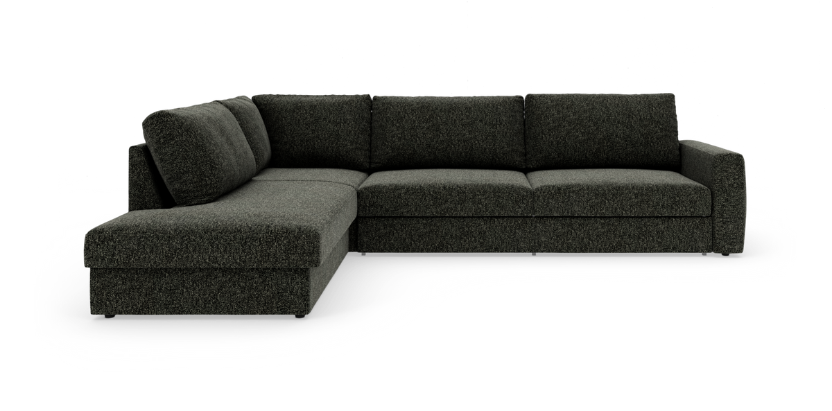 Mørkegrå L‑formet modulsofa med venstre chaiselong og bredt højre armlæn, fotograferet mod hvid studiobaggrund.