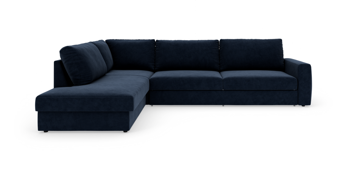 Mørkeblå L‑sofa med venstre chaiselong, moderne og polstret, frilagt på hvid baggrund.