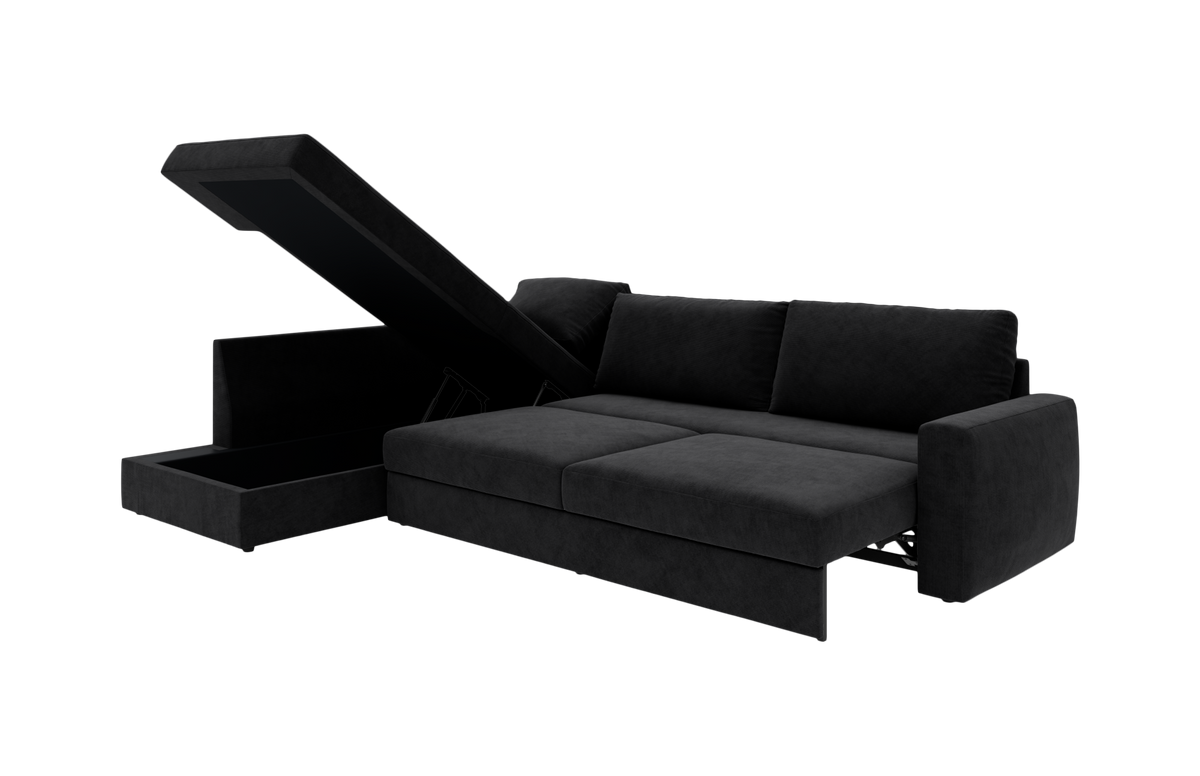 Sort hjørnesofa med chaiselong og opbevaring, låget er åbent; frilagt produktfoto i skrå frontvinkel.