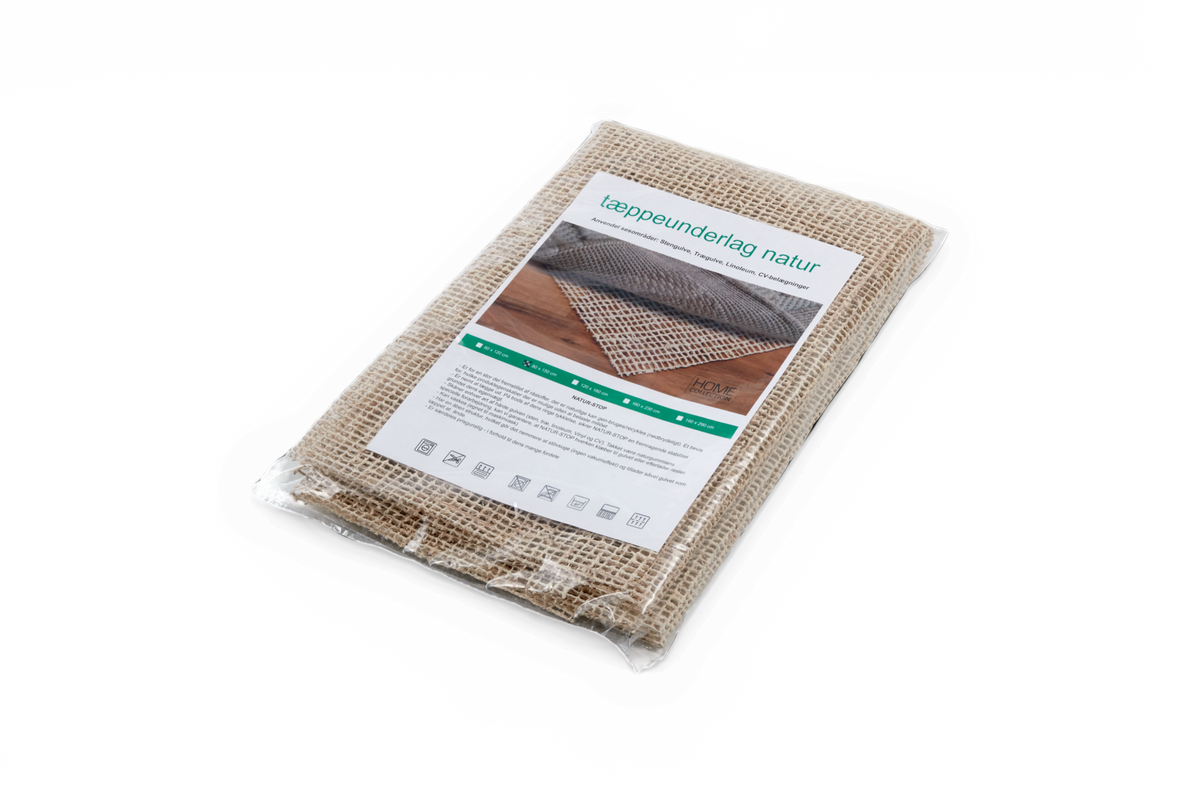 “tæppeunderlag natur” – skridsikkert underlag til tæpper i beige net, pakket på sort baggrund.