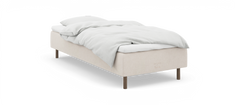 Beige enkeltseng med hvidt sengetøj og træben, nocturne by TEMPUR.