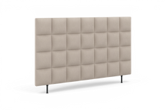 Beige polstret sengegavl med kvadratisk quiltning og slanke sorte ben.