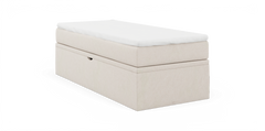 Beige sengeramme/modul med hvid topmadras på hvid baggrund.