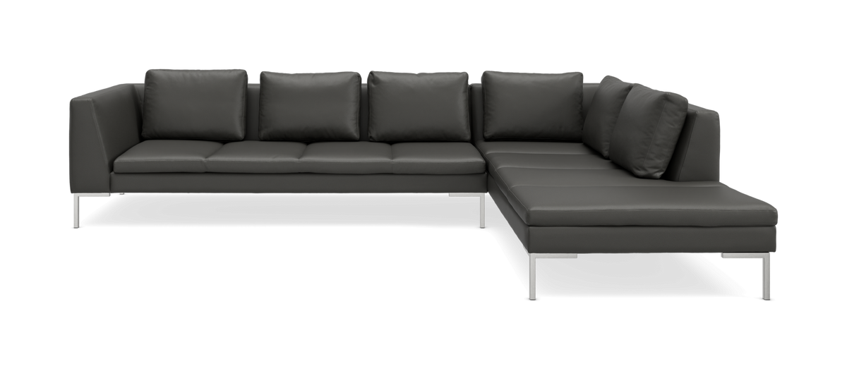 Mørkegrå L-formet modulsofa med chaiselong til højre og metalben.