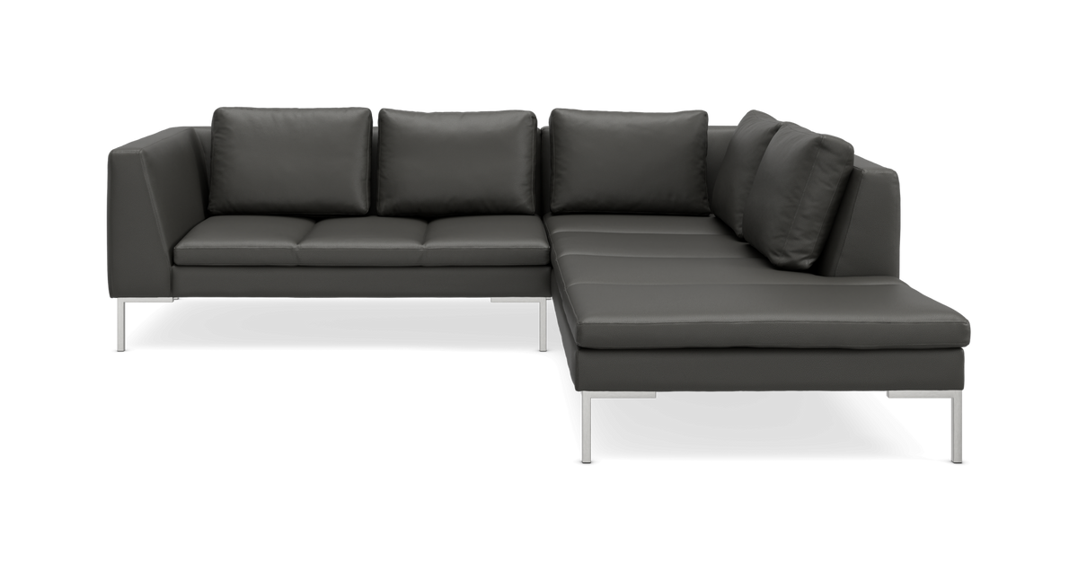 Mørkegrå L-formet modulsofa med metalben set forfra.