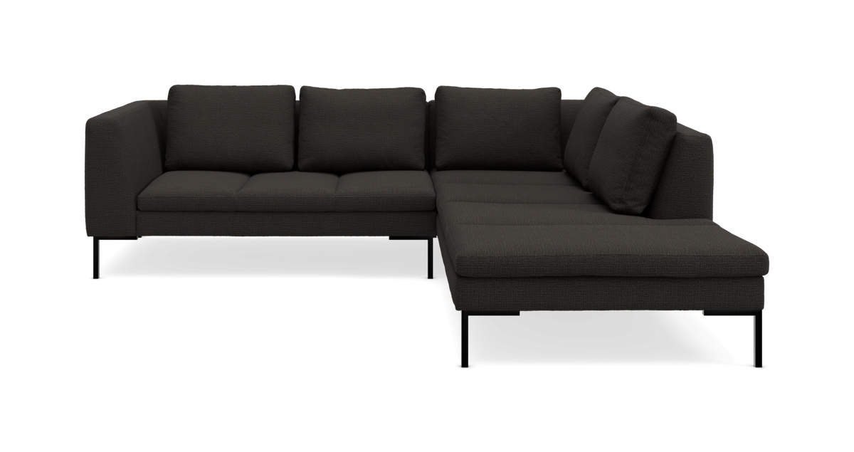 Mørkegrå L-formet sofa med højrevendt chaiselong og slanke metalben.
