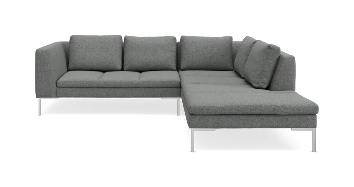 Grå L-formet modulsofa med højre chaiselong og metalben, fritstående produktbillede.