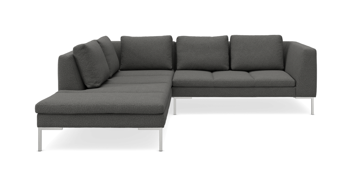 Mørkegrå modulsofa i L-form med venstrevendt chaiselong og metalben.