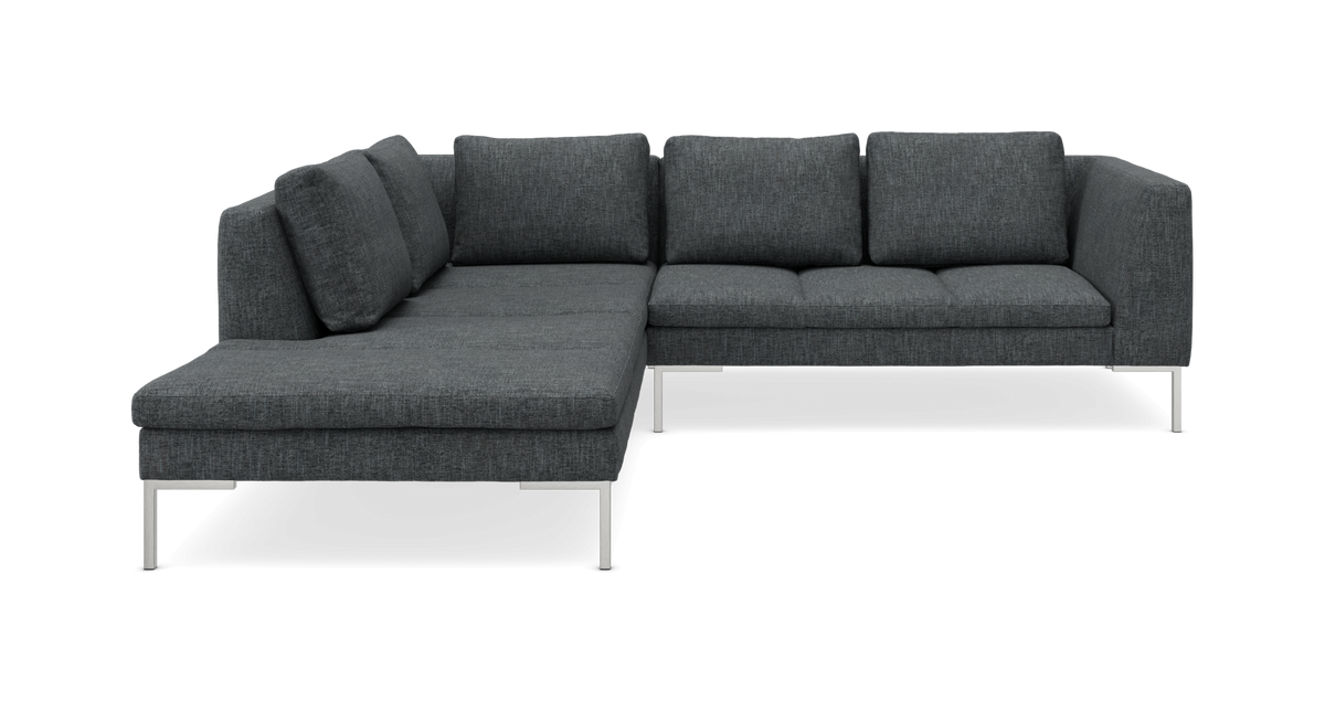 Mørkegrå hjørnesofa med venstre chaiselong og metalben, frilagt.