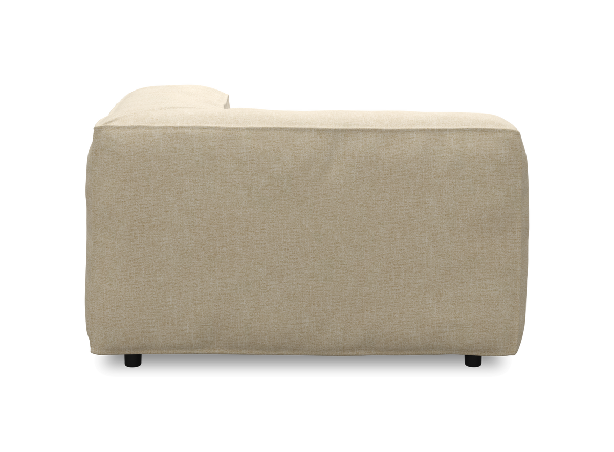 Sidevisning af en beige modulsofa-sektion i stof på hvid baggrund.