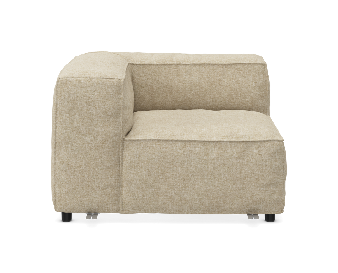 Beige modulsofa, hjørnemodul set forfra på hvid baggrund.