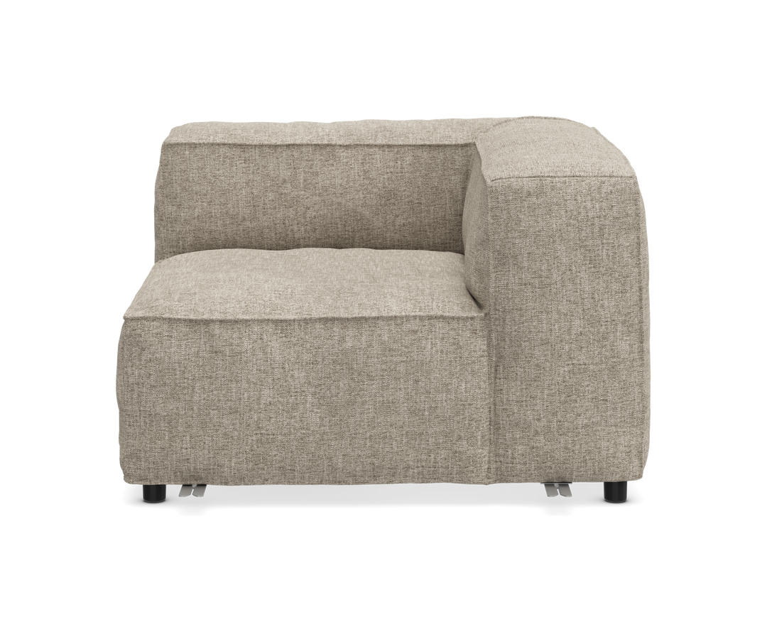 Beige modulsofa – hjørnemodul i stof, frontvisning på hvid baggrund.