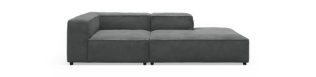 Mørkegrå modulsofa med højre chaiselong og lav ryg, frontvisning på isoleret baggrund.