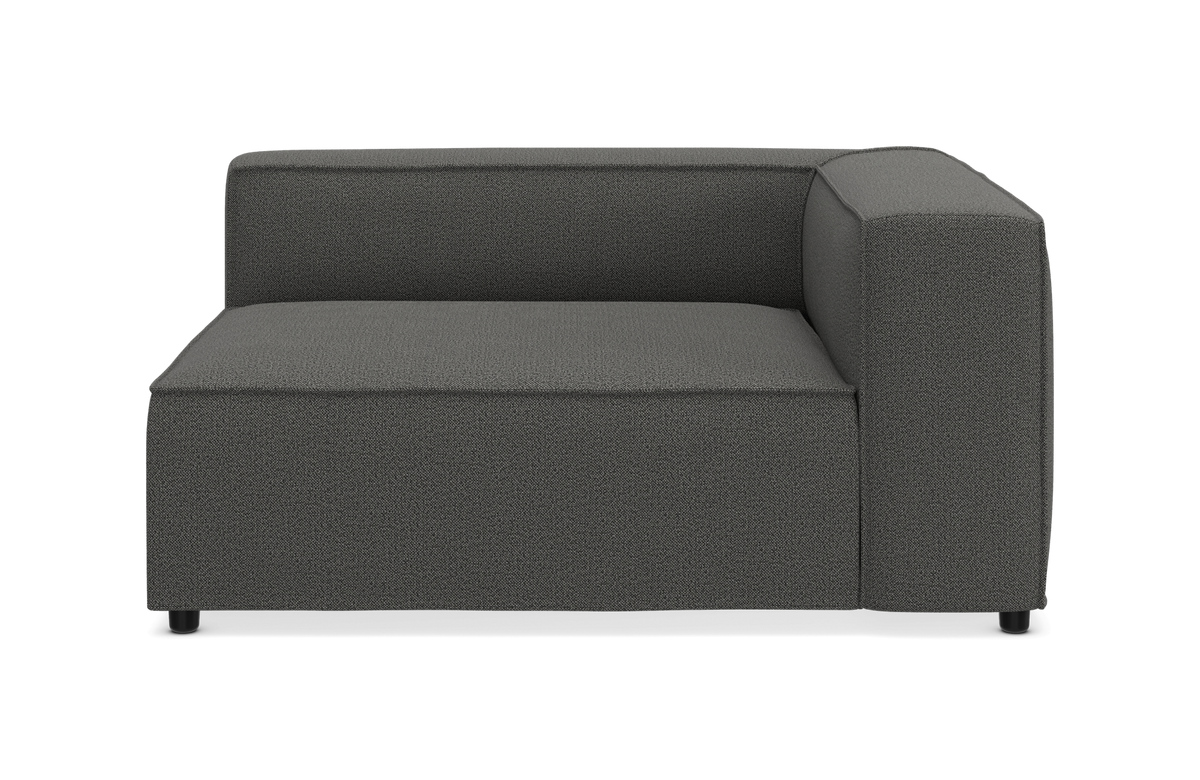 Mørkegrå modulsofa med højre armlæn, set forfra på hvid baggrund.