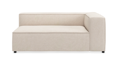 Beige højremodul til sofa med boxet design og lave sorte fødder.