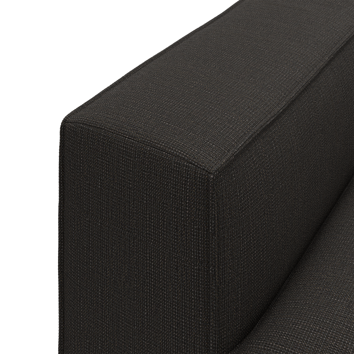 Nærbillede af mørkegråt sofa-armlæn i tekstil.