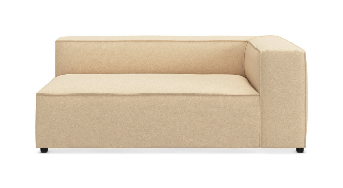 Beige modulsofa med højre armlæn, frilagt på hvid baggrund.