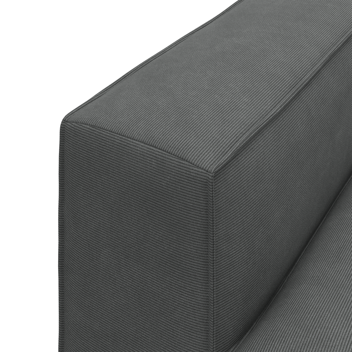 Nærbillede af mørkegrå sofa-arm i fløjl/corduroy.