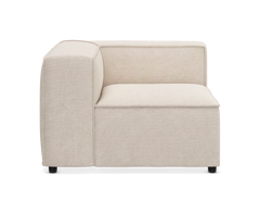 Beige modulsofa hjørnemodul fotograferet lige forfra på neutral baggrund.