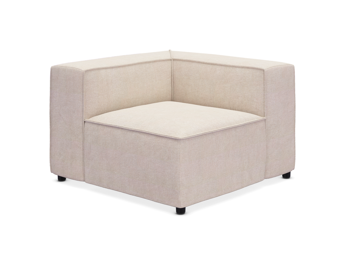 Beige modulsofa-hjørnemodul med kubisk design på hvid baggrund.