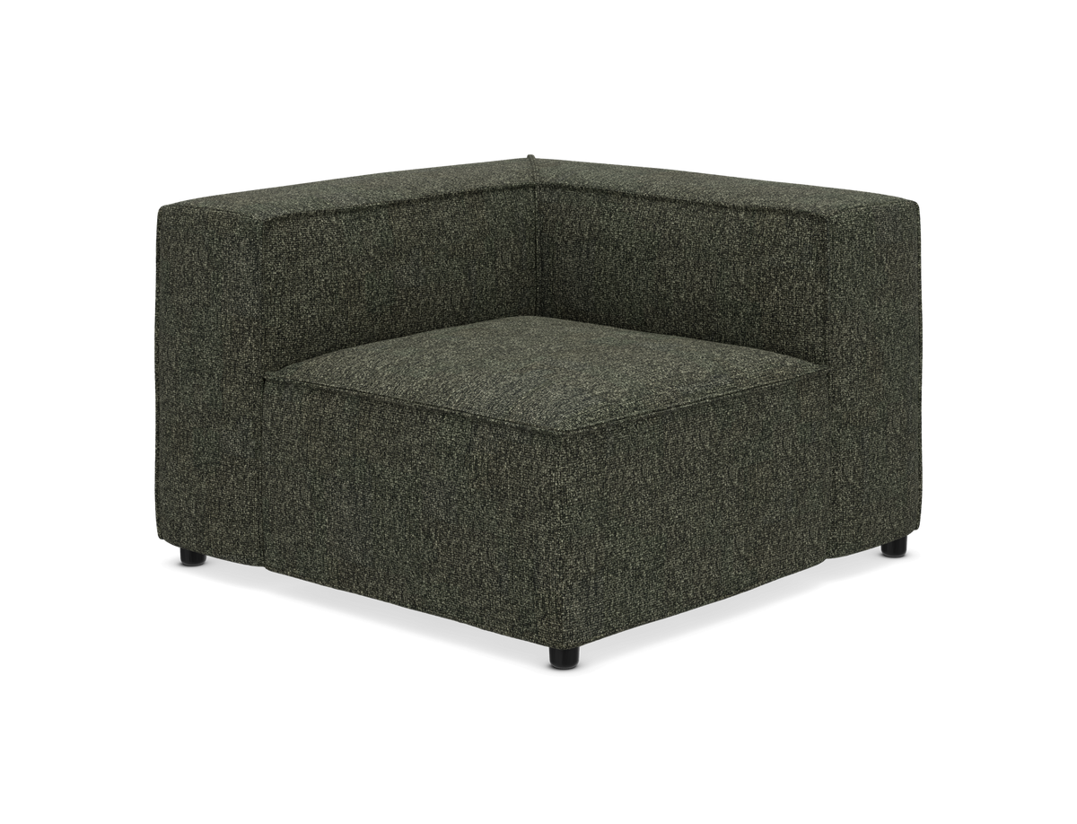 Modulsofa hjørnemodul i mørkegrønt stof, kubisk design på små sorte ben.