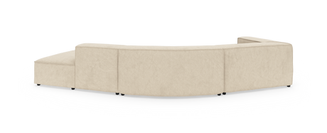 Beige, modulær, buet sofa set skråt bagfra på hvid studiebaggrund.