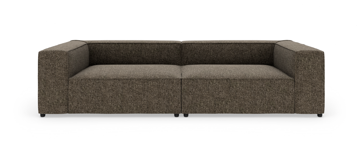 Brun, moderne modulsofa med lave rygge, isoleret på hvid baggrund i frontview.