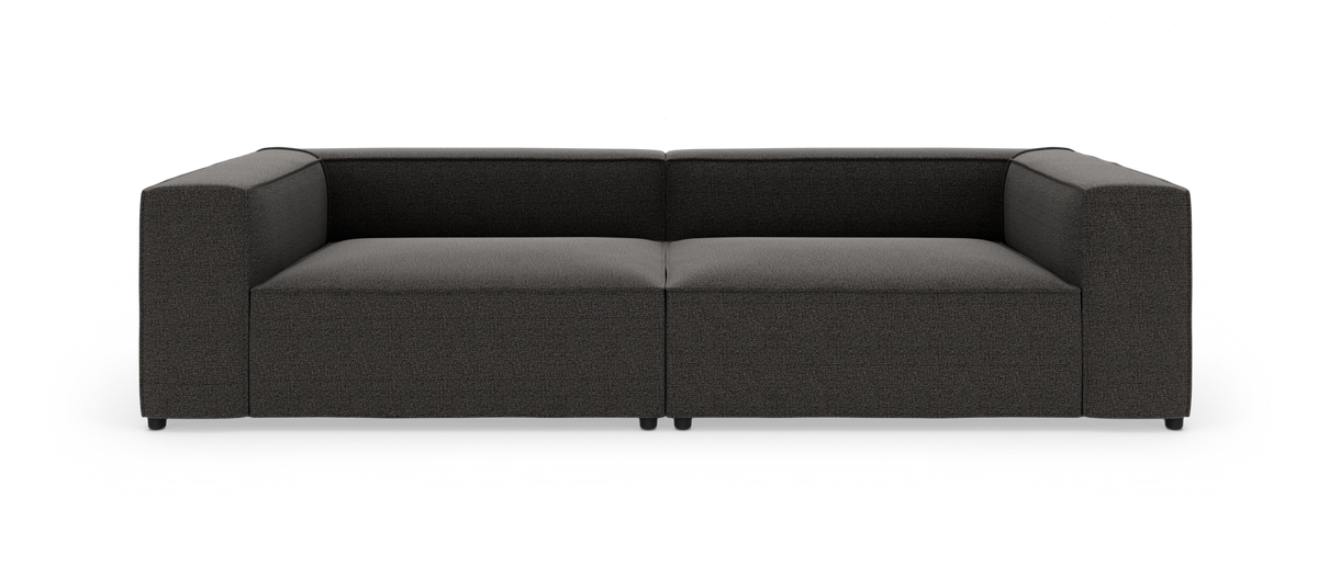 Mørkegrå, moderne 2-personers modulsofa med brede armlæn, fotograferet lige forfra på hvid studiobaggrund.