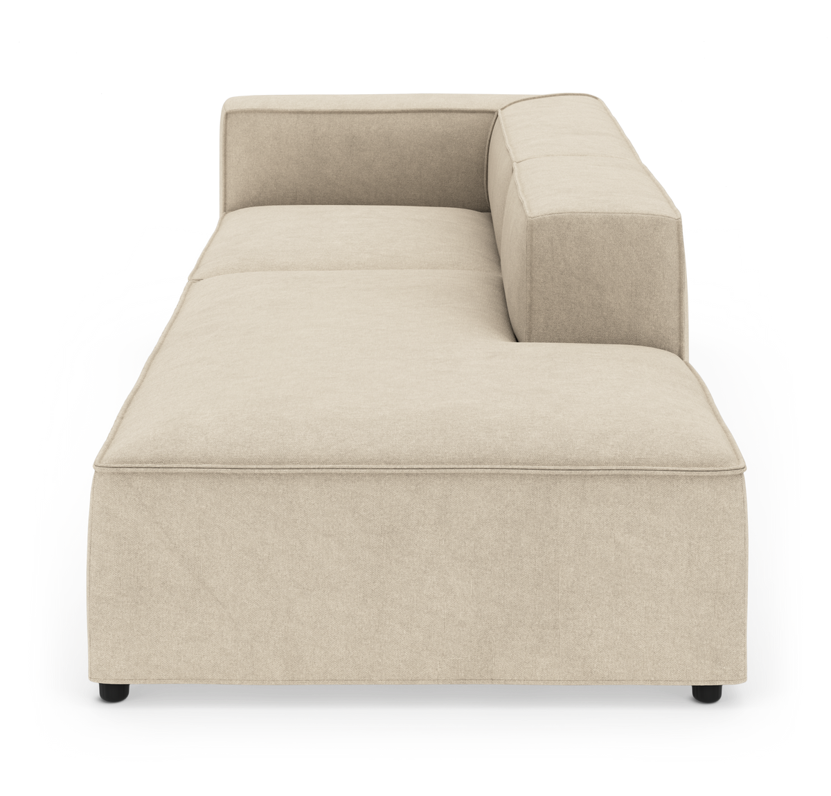 Beige modulsofa med chaiselong og højre armlæn, vist i studiemiljø forfra.